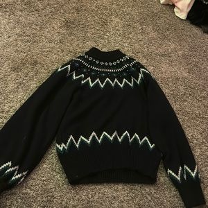 Woman’s medium black sweater with white and dark green stripes ❣️